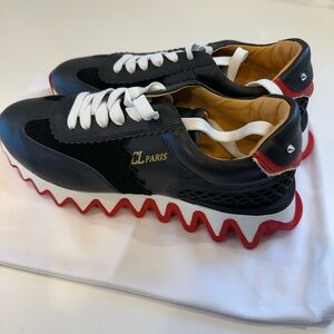Christian Louboutin

Loubishark Sneakers


Paris Black and Red Sneakers